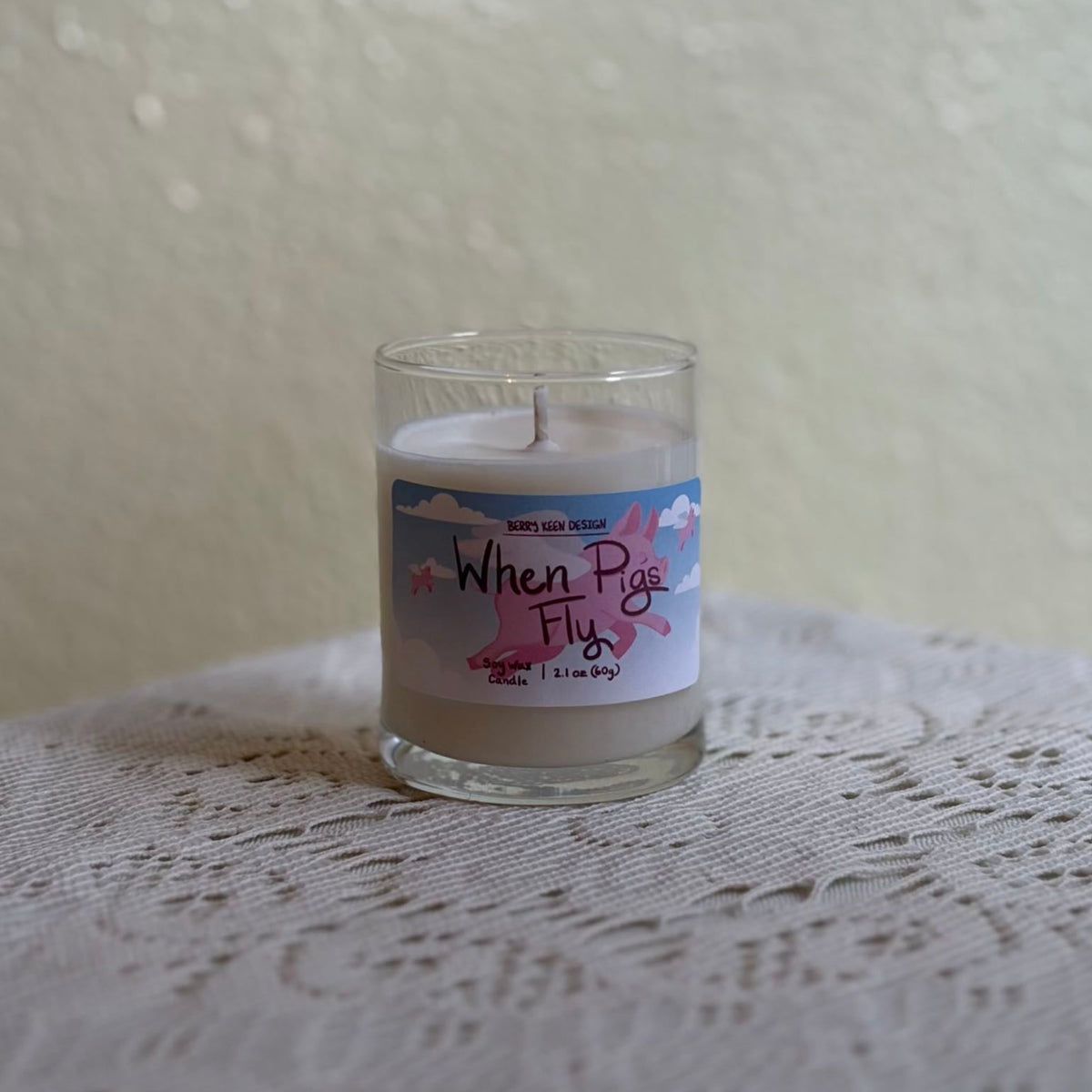 votive candle on a lace tablecloth