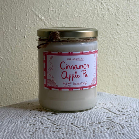Cinnamon Apple Pie candle on a lace table cloth