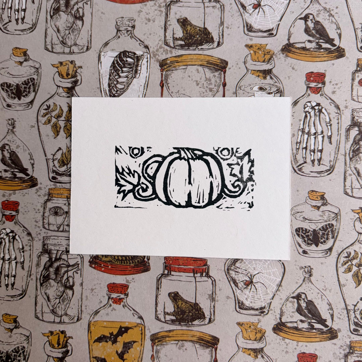Pumpkin with leaves printed on white paper