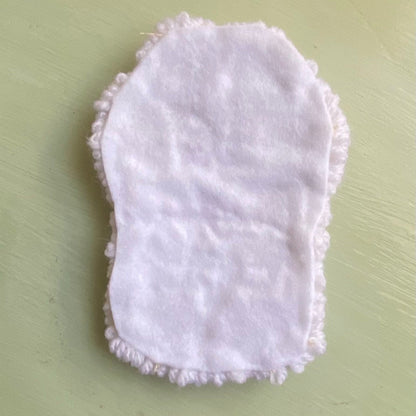 Back of the Punch needle coaster covered in felt